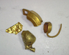 Gold Ear ornament with a drop